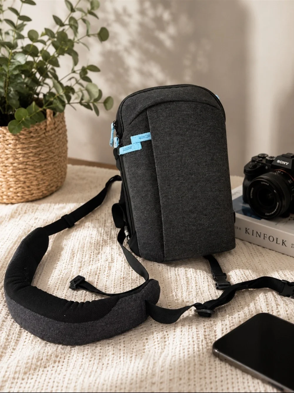 Men's Compact Black Sling Bag with Light Blue Accents